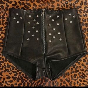 Backbite black leather studded shorts